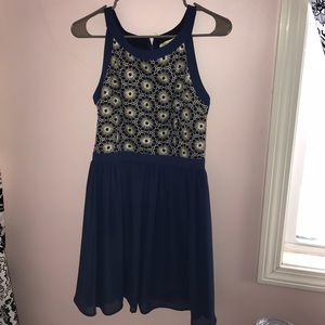 Francesca’s blue and gold chiffon dress